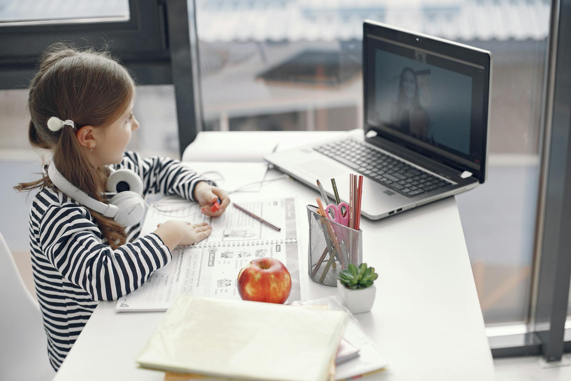 a girl studying at the desk